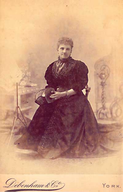 Marie-Lachenal-seated-with-concertina